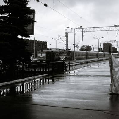Nocturnal Rails Through Distant Rain