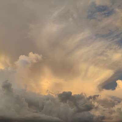 Golden Storm Over Still Waters