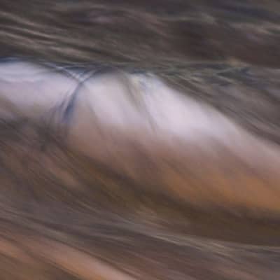 Midday Whisper over Glowing Stream